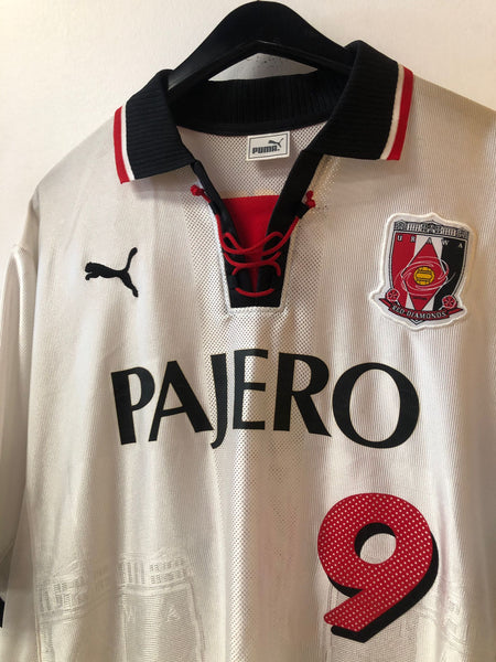 Urawa Red Diamonds Home football shirt 2004. Sponsored by Mitsubishi
